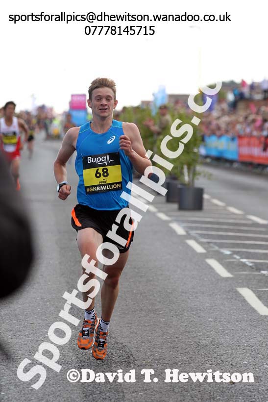 Matt Sharp finishing the mens 2014 BUPA Great North Run. Photo: David T. Hewitson/Sports for All Pics